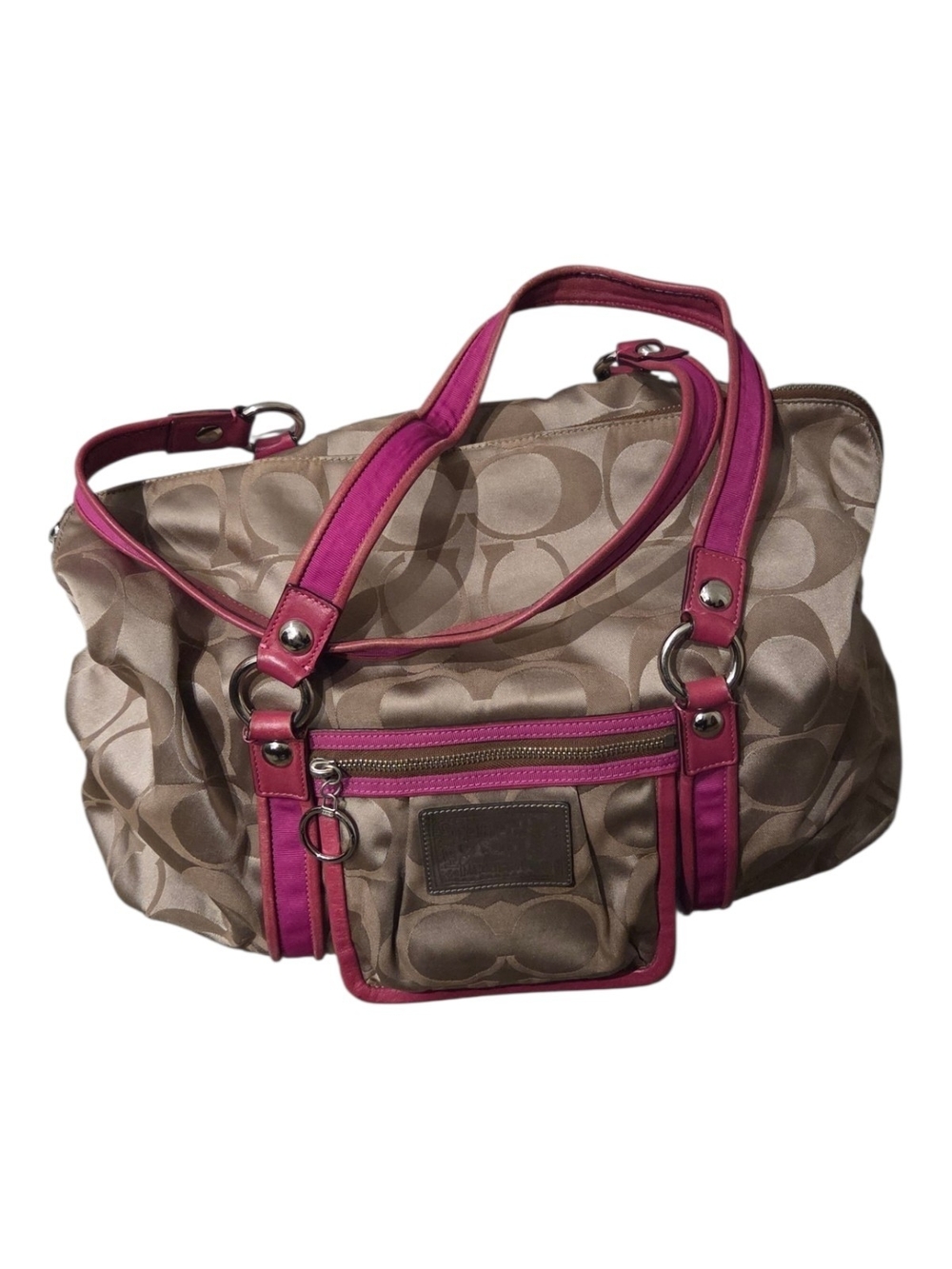Coach Poppy Signature C Spotlight Pocket Tote in the Khaki/Fuchsia colorway.
